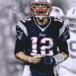 Image 1 of Tom Brady autographed photo worth it